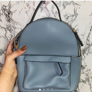 Blue mini backpack with gold